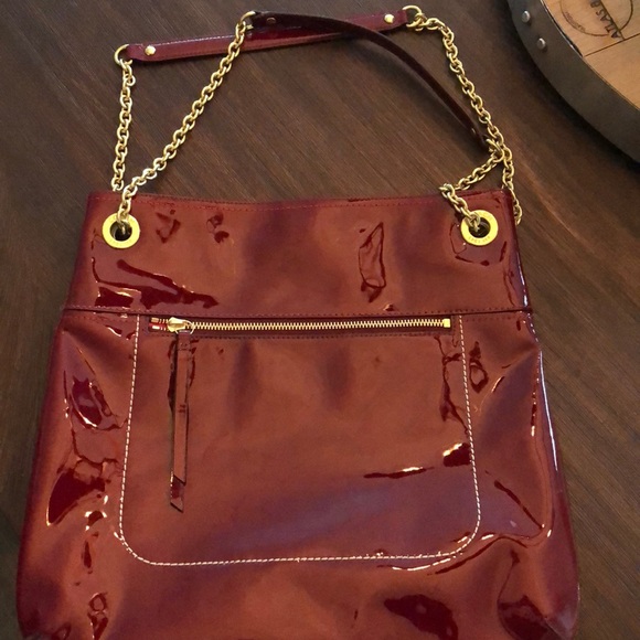 coach burgundy patent leather bag
